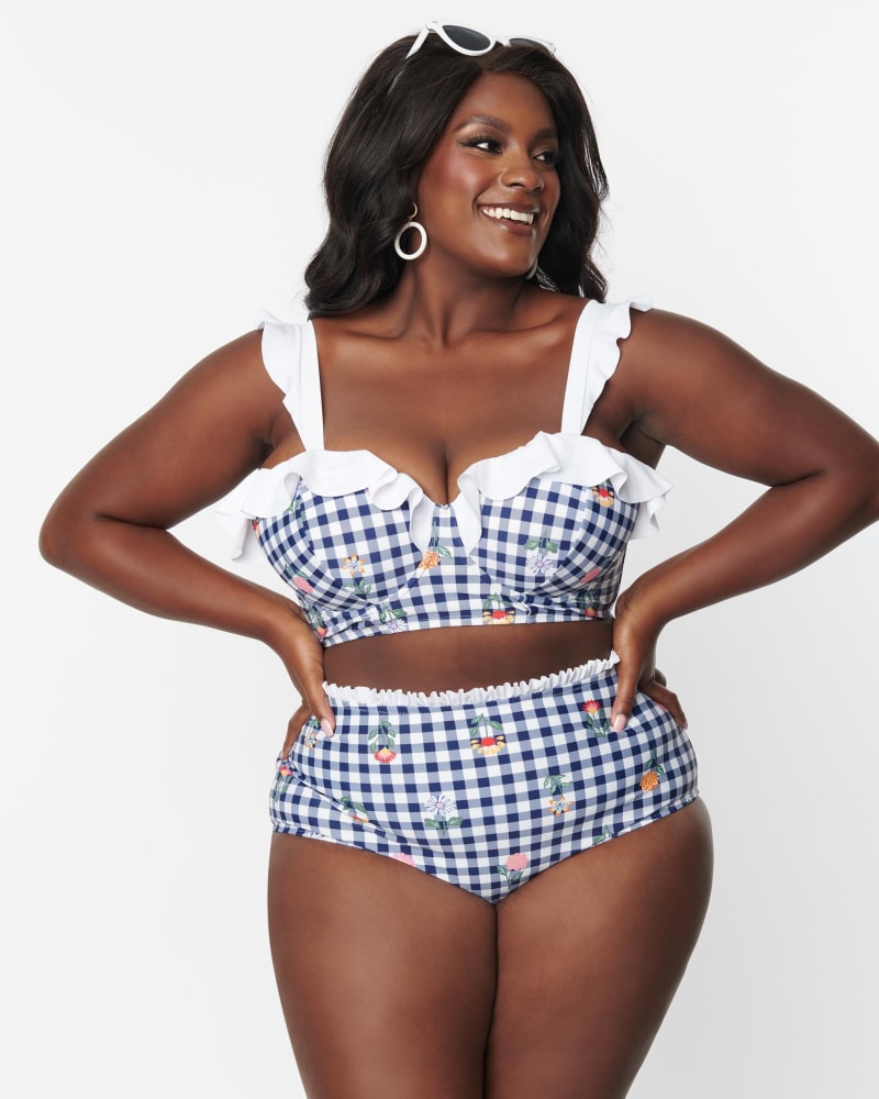 Front of a model wearing a size 3X Unique Vintage Navy Gingham & Floral Southampton Swim Top in Blue, Gingham, Floral, Plaid by Unique Vintage. | dia_product_style_image_id:288433